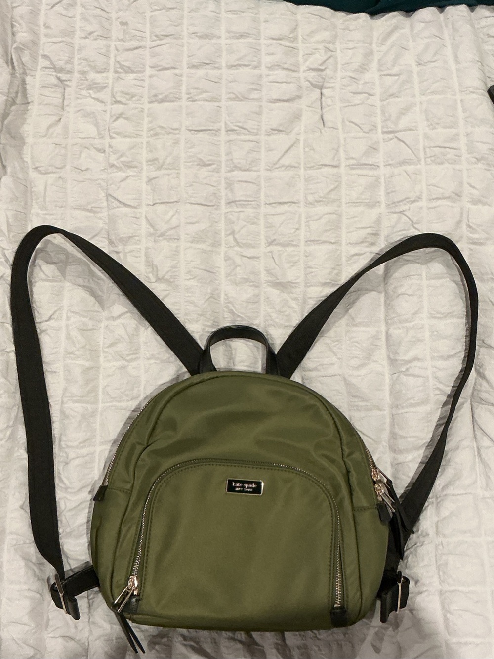 kate spade olive green nylon mini backpack with black straps and gold hardware